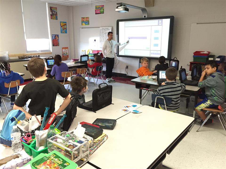 Mr. Walker demonstrating on Promethean Board 
